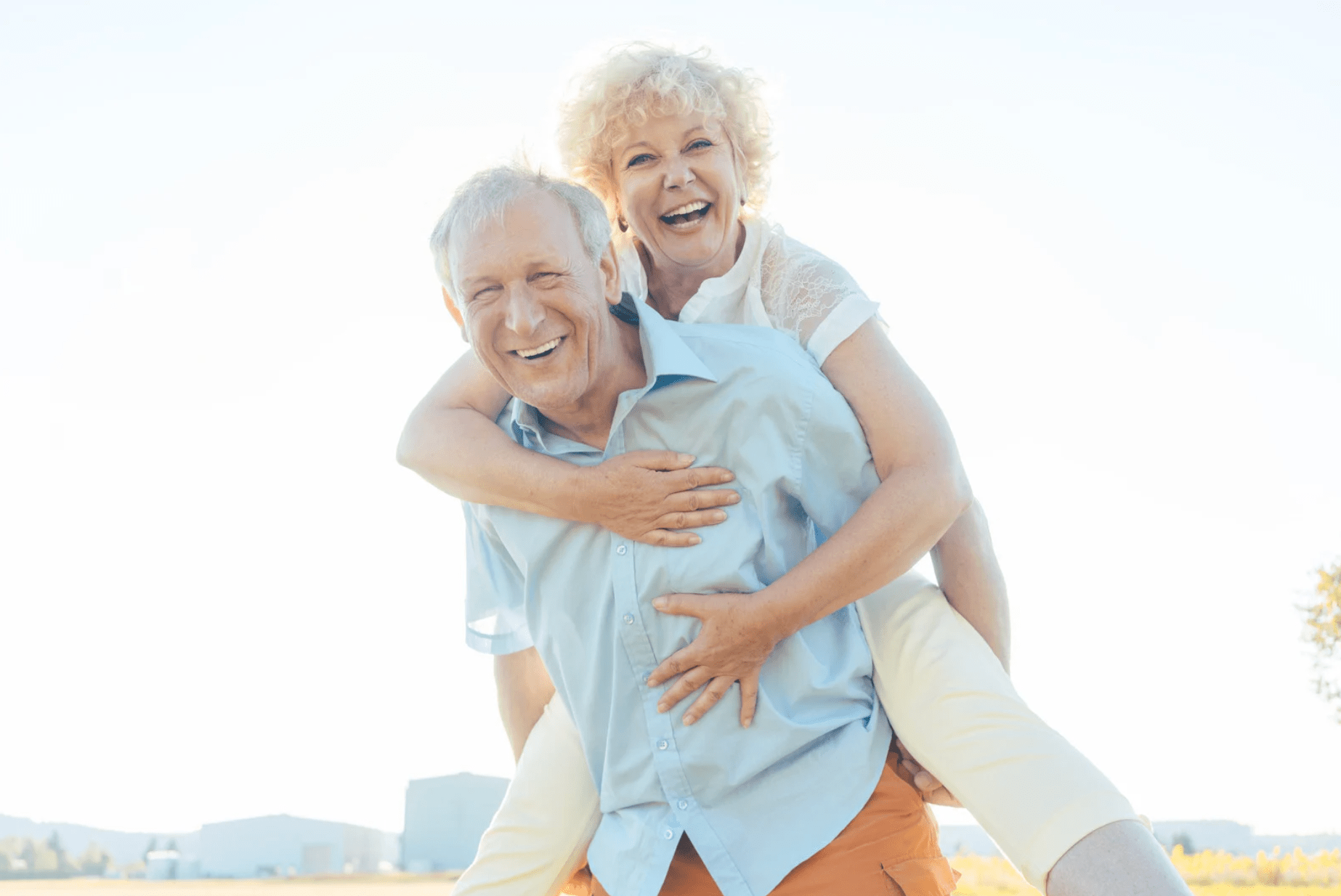Happy older couple after wife's successful treatment of Diabetic Peripheral Neuropathy.